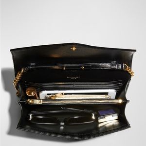 Authentic YSL black Caviar bag.